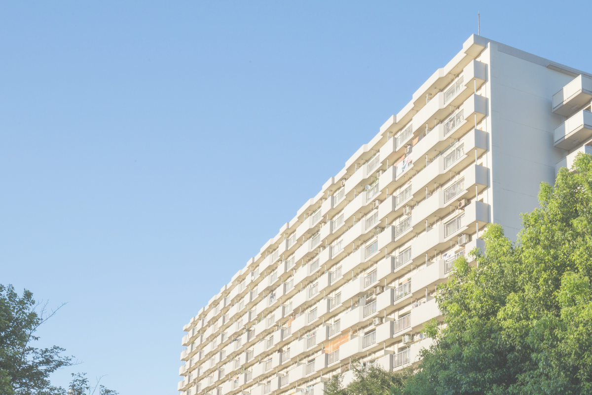 Apartment building under a clear blue sky