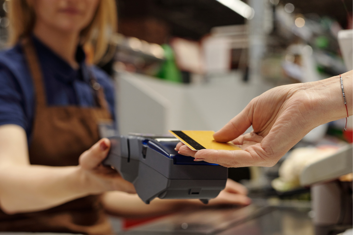 Customer paying by card at a store in Japan
