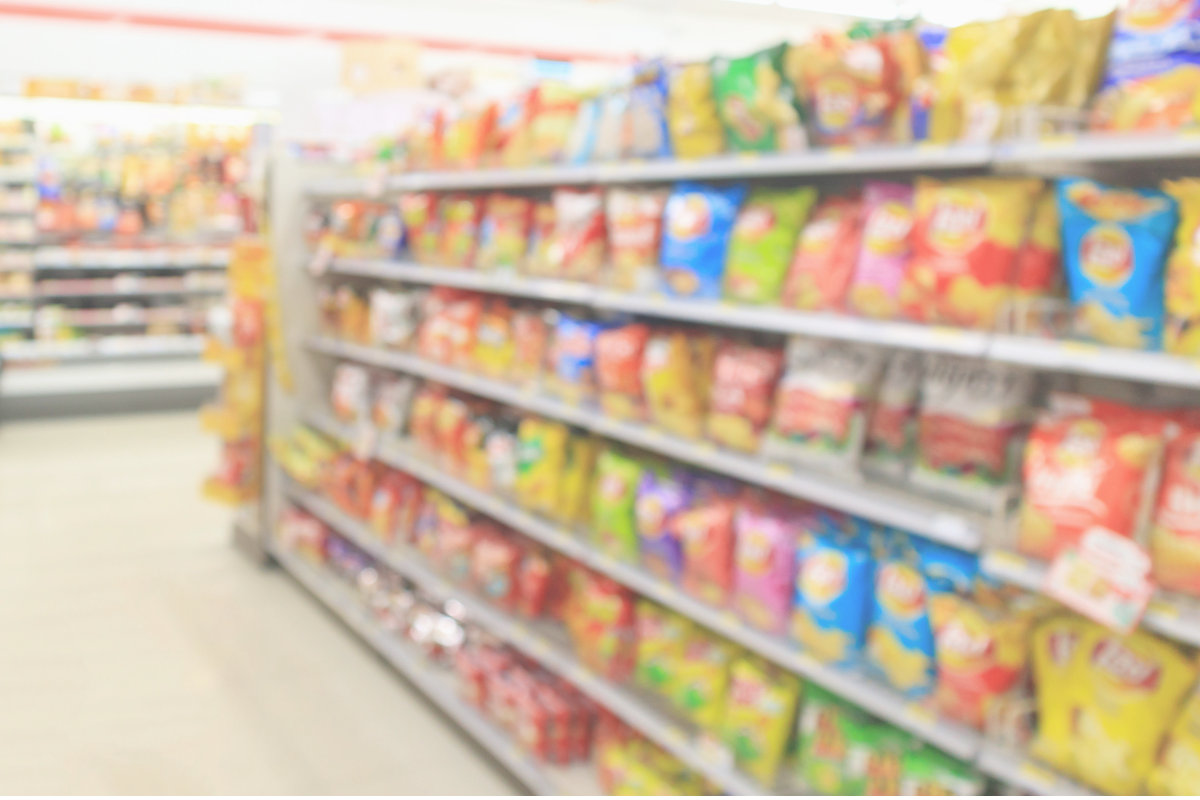 Shelves of snacks and drinks inside a convenience store in Japan